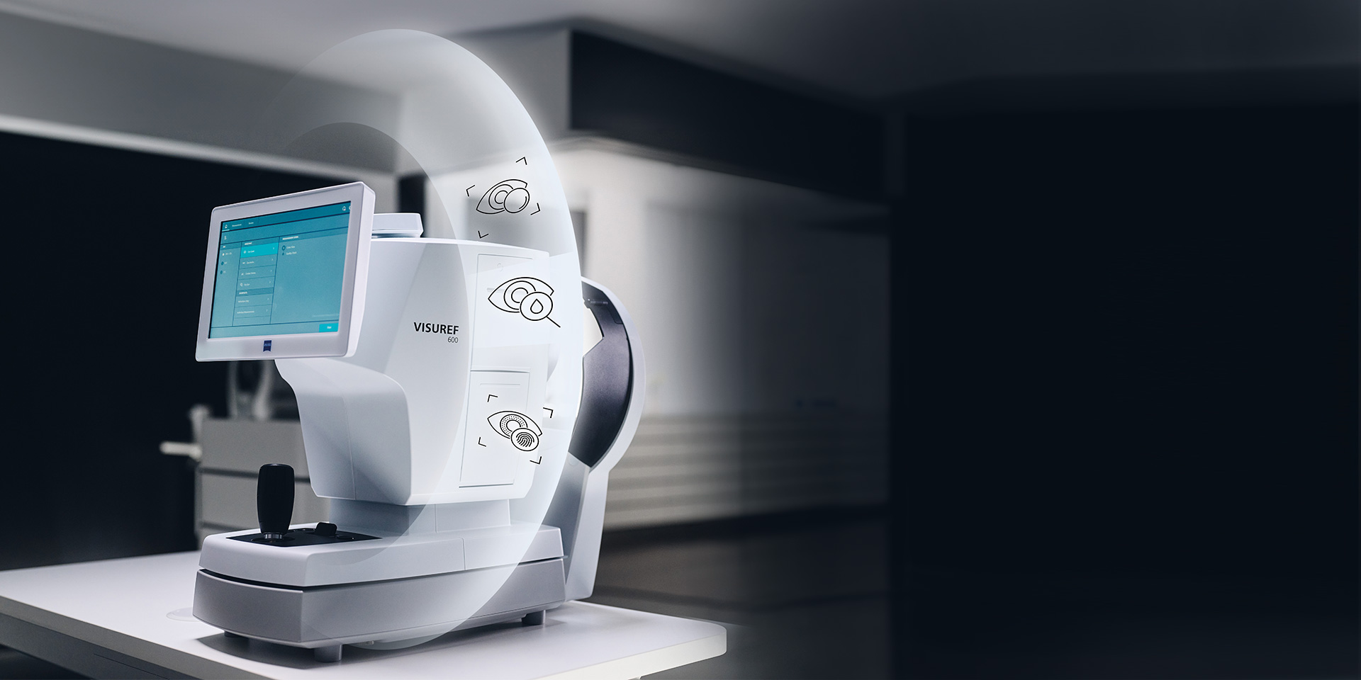На рисунку показано ZEISS VISUREF 600 на столі з зображенням напівпрозорого кола, оточеного піктограмами.