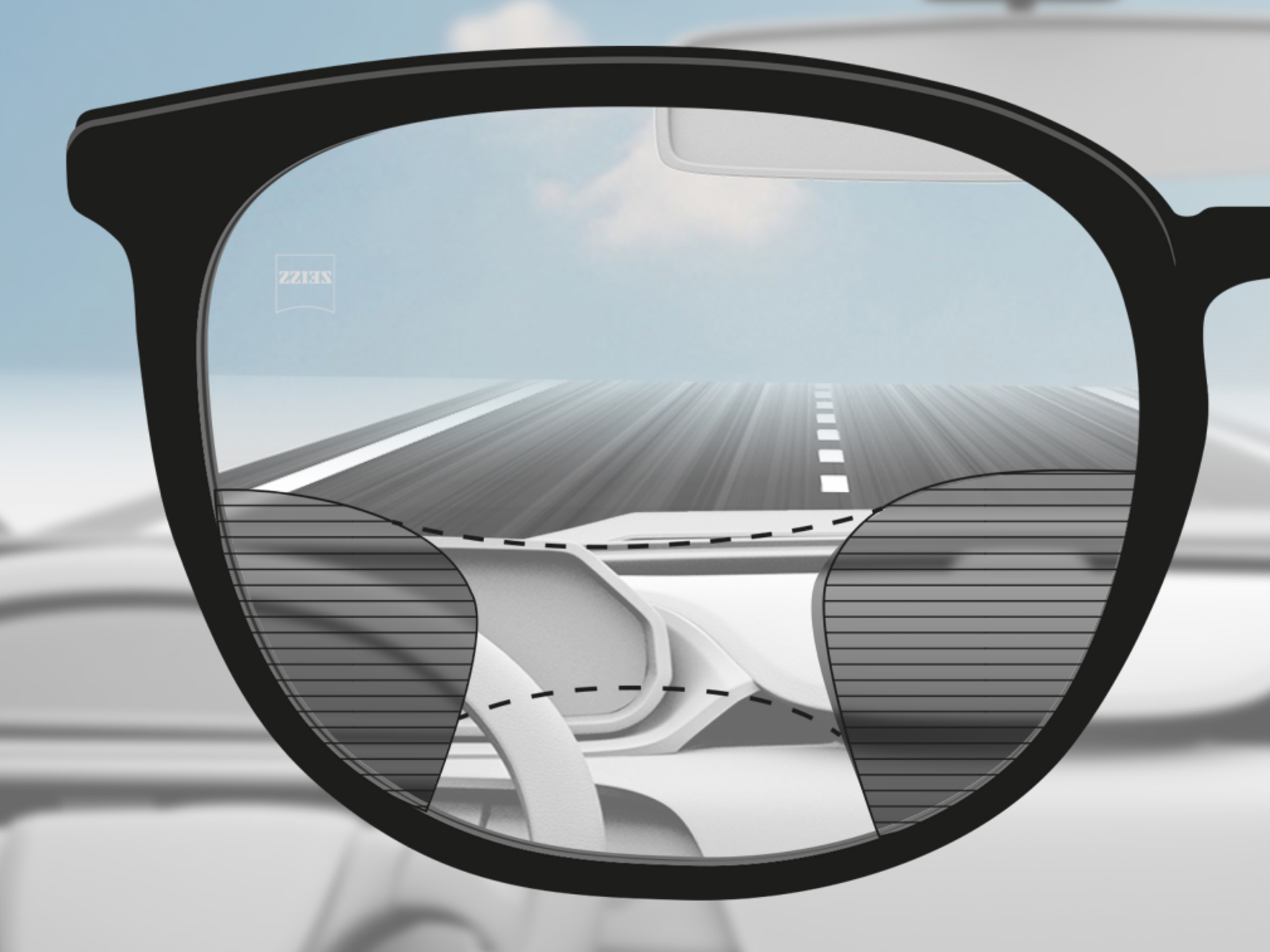 Зображення при погляді крізь лінзу ZEISS Progressive DriveSafe: зони огляду адаптовані таким чином, щоб водій чітко бачив дорогу та панель приладів.