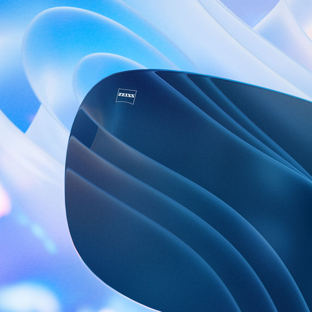 Згенероване комп&apos;ютером зображення тонованої лінзи, що ефективно блокує відблиски, видимі на фоні.